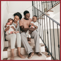 Image of family sitting together in their home